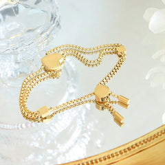 Hearts & Harmony – 18K Gold Peach Heart and Square Motif Bracelet