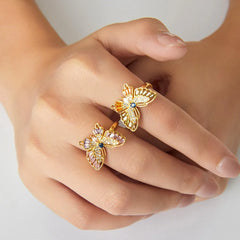 Close-up of elegant butterfly ring with radiant sparkle and gold shine