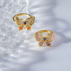 Romantic butterfly ring styled with formal eveningwear