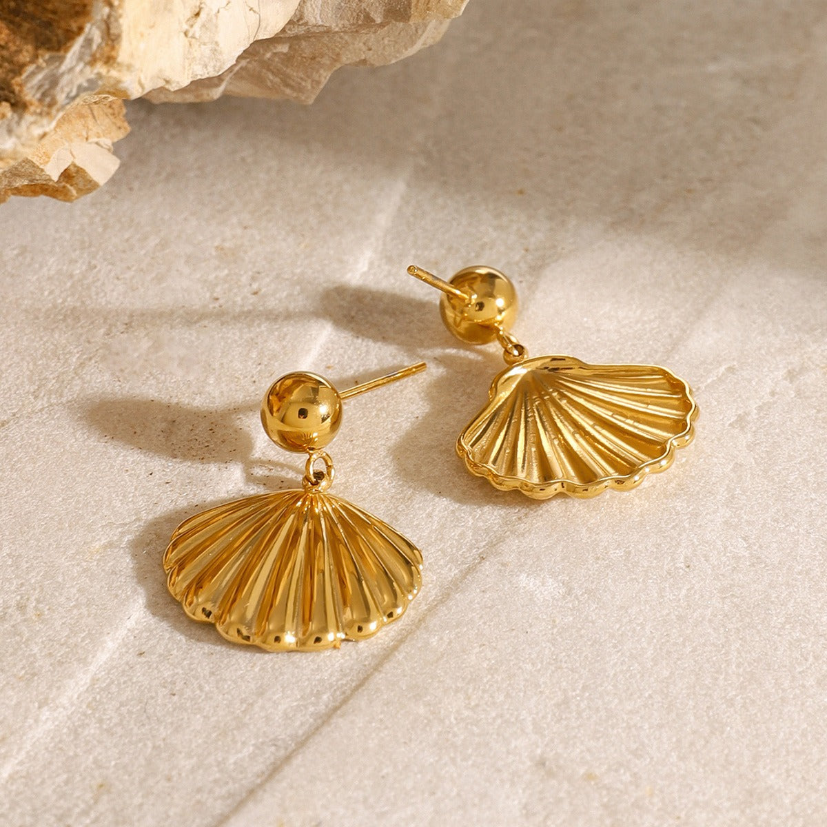 Solenne 18K gold drop earrings with polished bead and natural shell accents