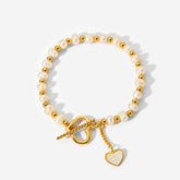 Lustre Link – 18K Gold Pearl Heart Bracelet with OT Clasp