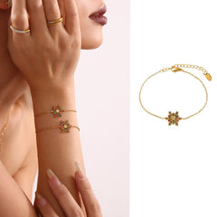 18K gold snowflake bracelet with gemstone inlay