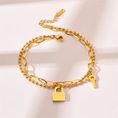 Elegant gold bracelet on wrist featuring simple heart-shaped lock
