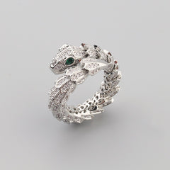 Close-up of snake ring showing coiled body and sparkling zircon stones