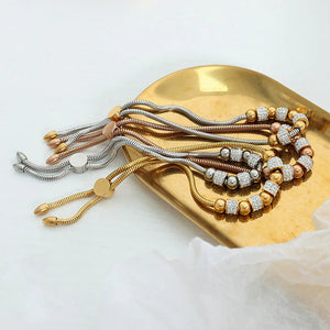 Regal Sphere β 18K Gold Round Beads and Cylindrical Diamond Bracelet