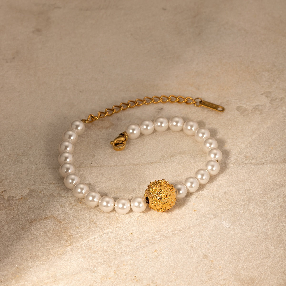 Regal Bloom – 18K Gold Hammered Flower and Pearl Design Bracelet