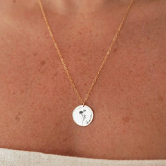 Model wearing silver birthday flower name necklace with elegant outfit