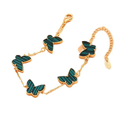 Wings of Fortune – 18K Gold Butterfly and Clover Pendant Bracelet