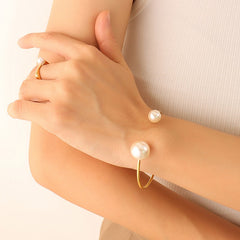Model wearing Perla bracelet on minimalist outfit