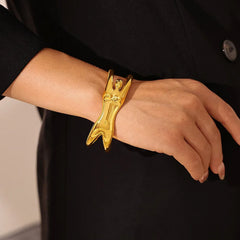 Model wearing Vita open bracelet with minimalist neutral outfit