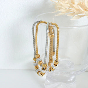 Regal Sphere β 18K Gold Round Beads and Cylindrical Diamond Bracelet