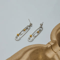 Double safety pin earrings with gold bead embellishment