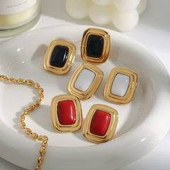 18K gold arc-angled rectangular earrings on white background