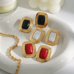 18K gold arc-angled rectangular earrings on white background