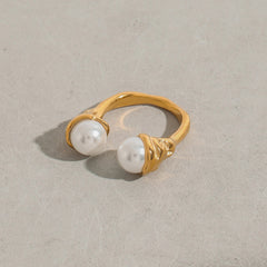 Minimalist gold ring with dual pearls at open ends