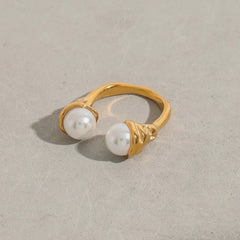 Minimalist gold ring with dual pearls at open ends