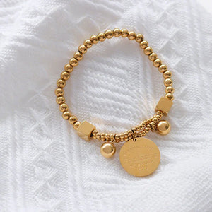 Golden Echo β 18K Gold Beaded Bracelet with Retro Coin Charm