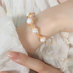 Golden Serenity β 18K Gold Light Luxury Pearl Inlaid Bracelet