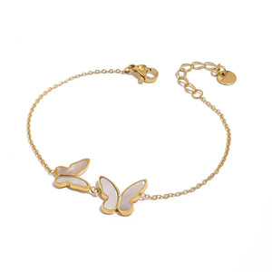 Wings of Elegance – 18K Gold Butterfly Gemstone Luxury Bracelet