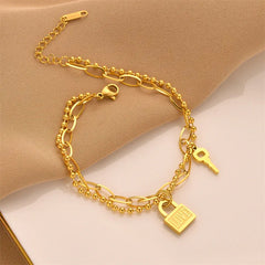 Gift-ready gold bracelet with symbolic heart charm