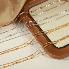 Timeless Layers – 18K Gold Double-Layer Elegant Bracelet