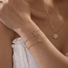 Elegant winter-inspired gold bracelet with zircon details