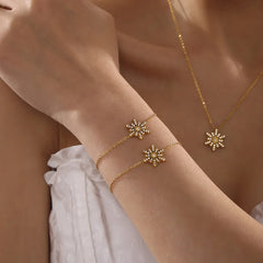 Elegant winter-inspired gold bracelet with zircon details
