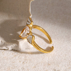 Celestial Heart – 18K Gold Angel Wings with Heart-Shaped Gemstone Ring