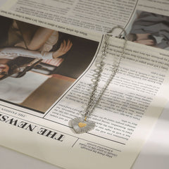 Fashion necklace with textured heart pendant