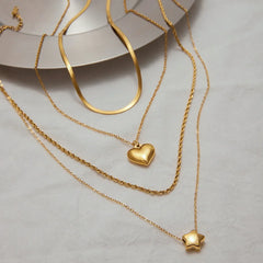 Double-layer chain necklace with playful star or romantic heart