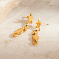 Trendy marine gold earrings for women with seahorse design