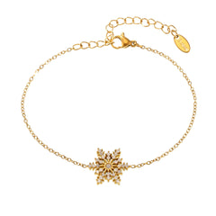 Romantic gold bracelet with snowflake and sparkling gems