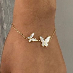 Wings of Elegance – 18K Gold Butterfly Gemstone Luxury Bracelet