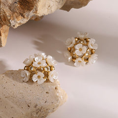 Handcrafted floral gold earring with radiant gemstone center
