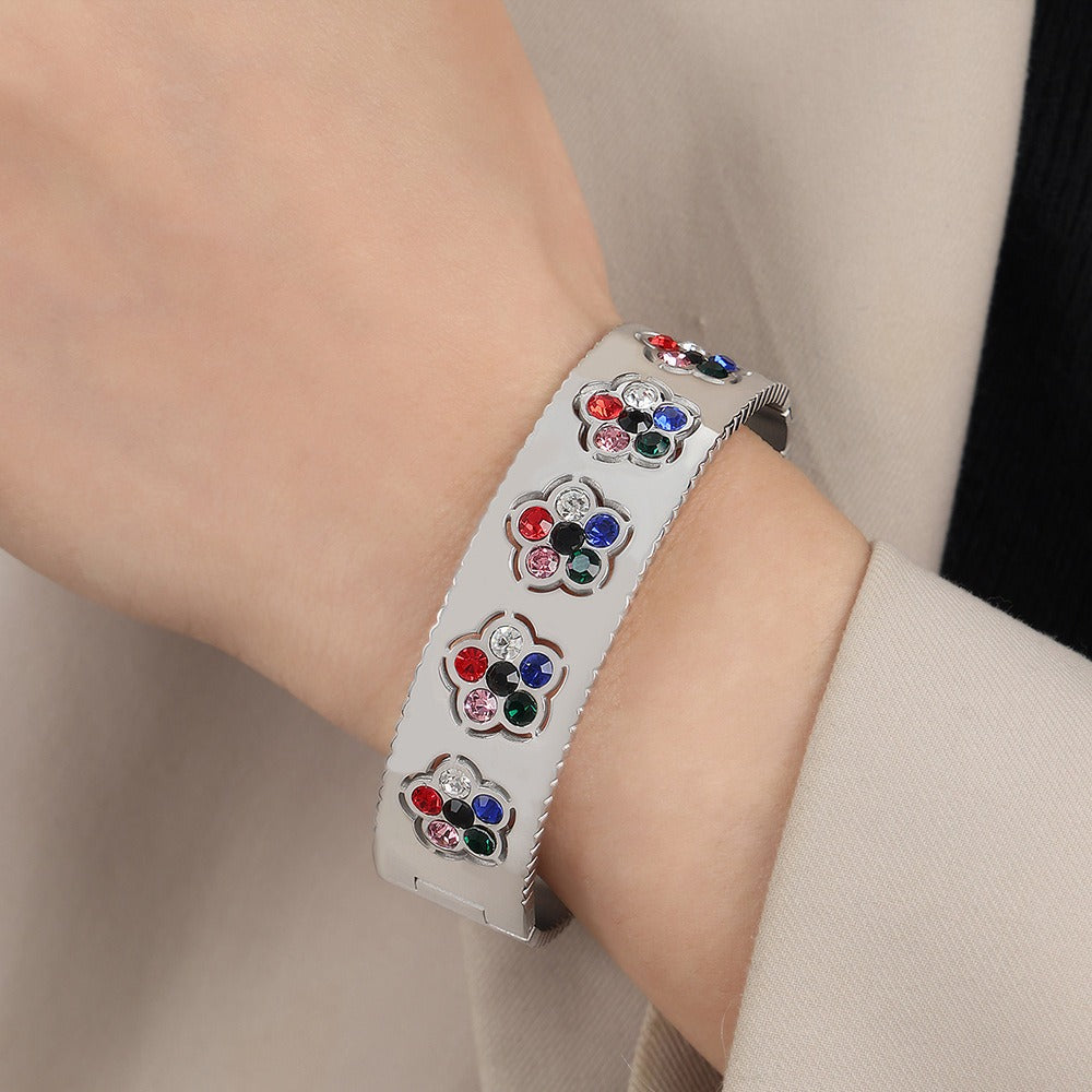 Sparkling diamond-set floral pattern on Floral Grace 18K Gold Bracelet