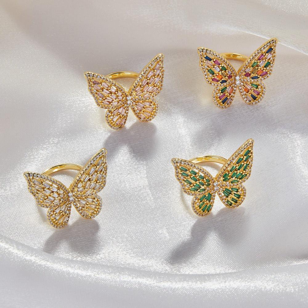 Side profile showing butterfly wings and sparkle of zircon stones