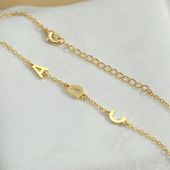 Detailed view of custom name engraving on Signature Whisper Bracelet