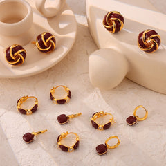 Elegant jewelry box with Aurora Geo gold earrings inside