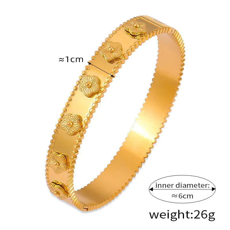 Gold flower bracelet styled on wrist, capturing shine and detail