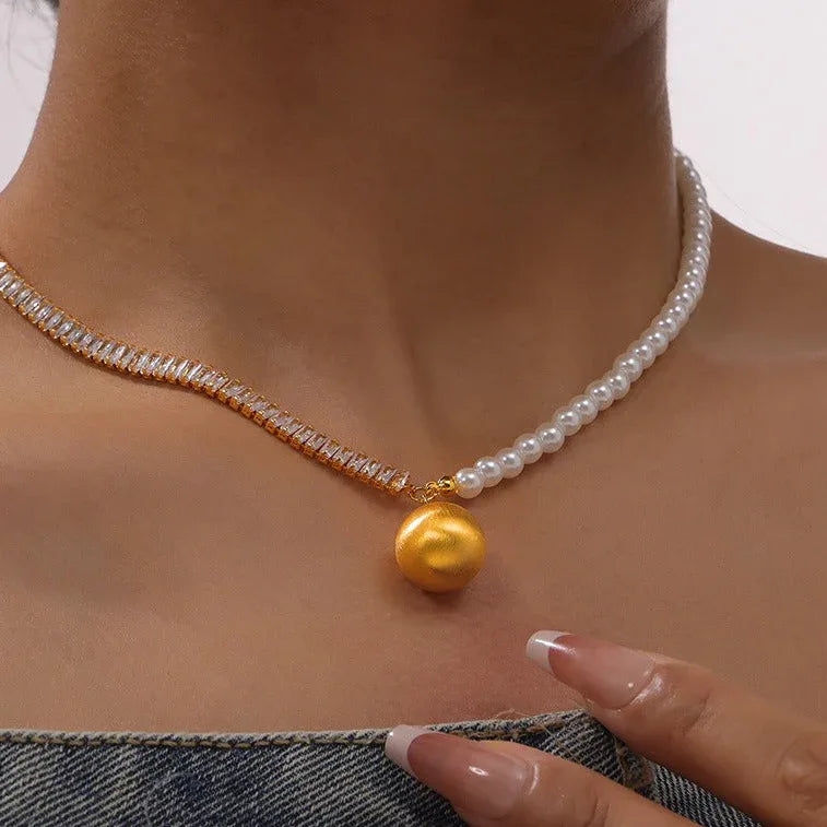 Elegant gold pendant necklace styled for formal outfit