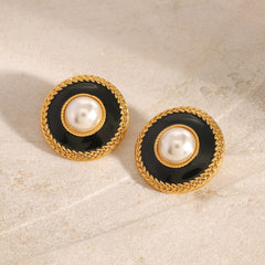 Gold sculpted texture and centered pearl on round earrings
