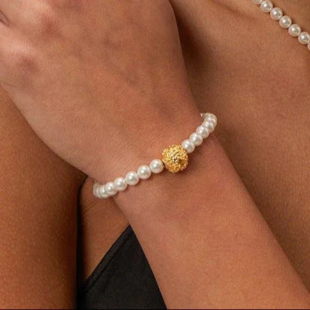 Regal Bloom – 18K Gold Hammered Flower and Pearl Design Bracelet