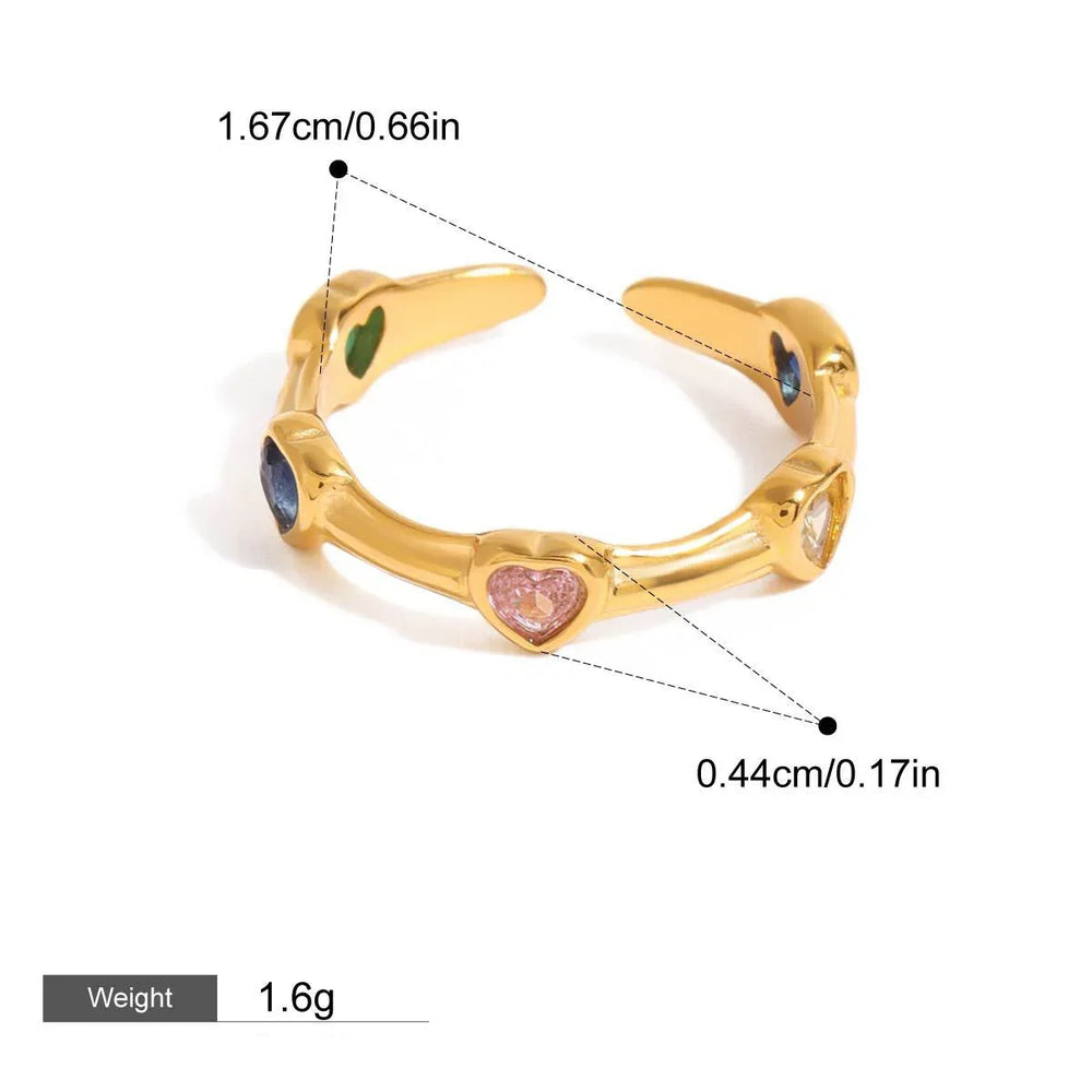 Elegant open ring with zircon heart inlays in gold