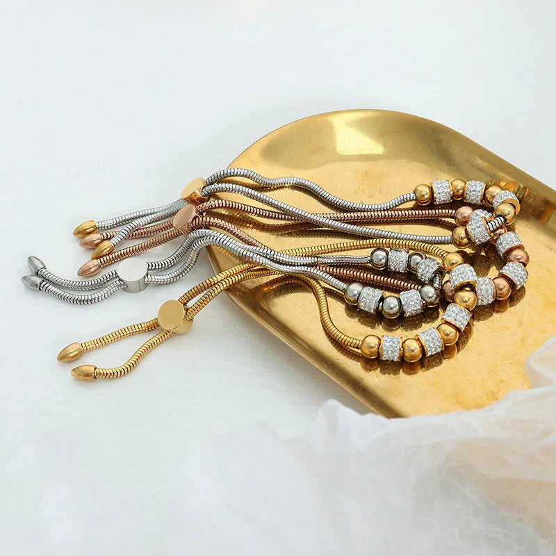 Regal Sphere – 18K Gold Round Beads and Cylindrical Diamond Bracelet