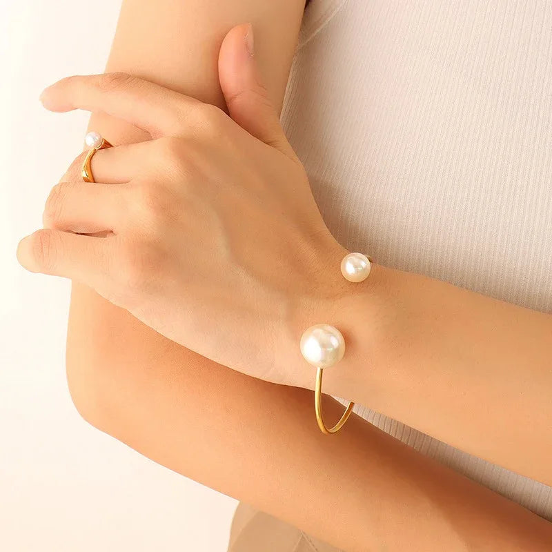 Model wearing Perla bracelet on minimalist outfit