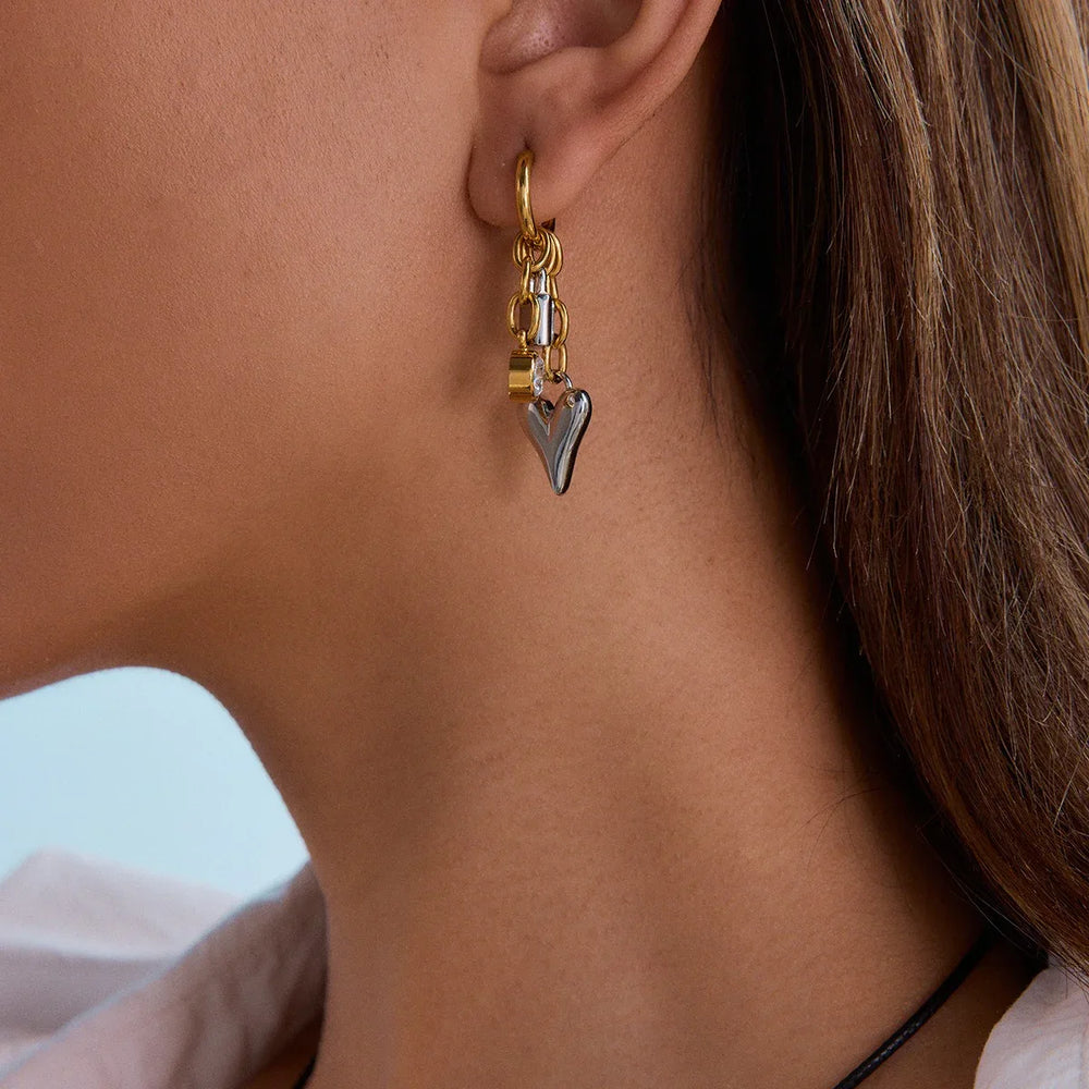 Trendy gold and silver lock earrings with heart pendant