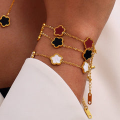 "Blooming Elegance Bracelet – 18K Gold with Flower-Shaped Gemstone Inlays