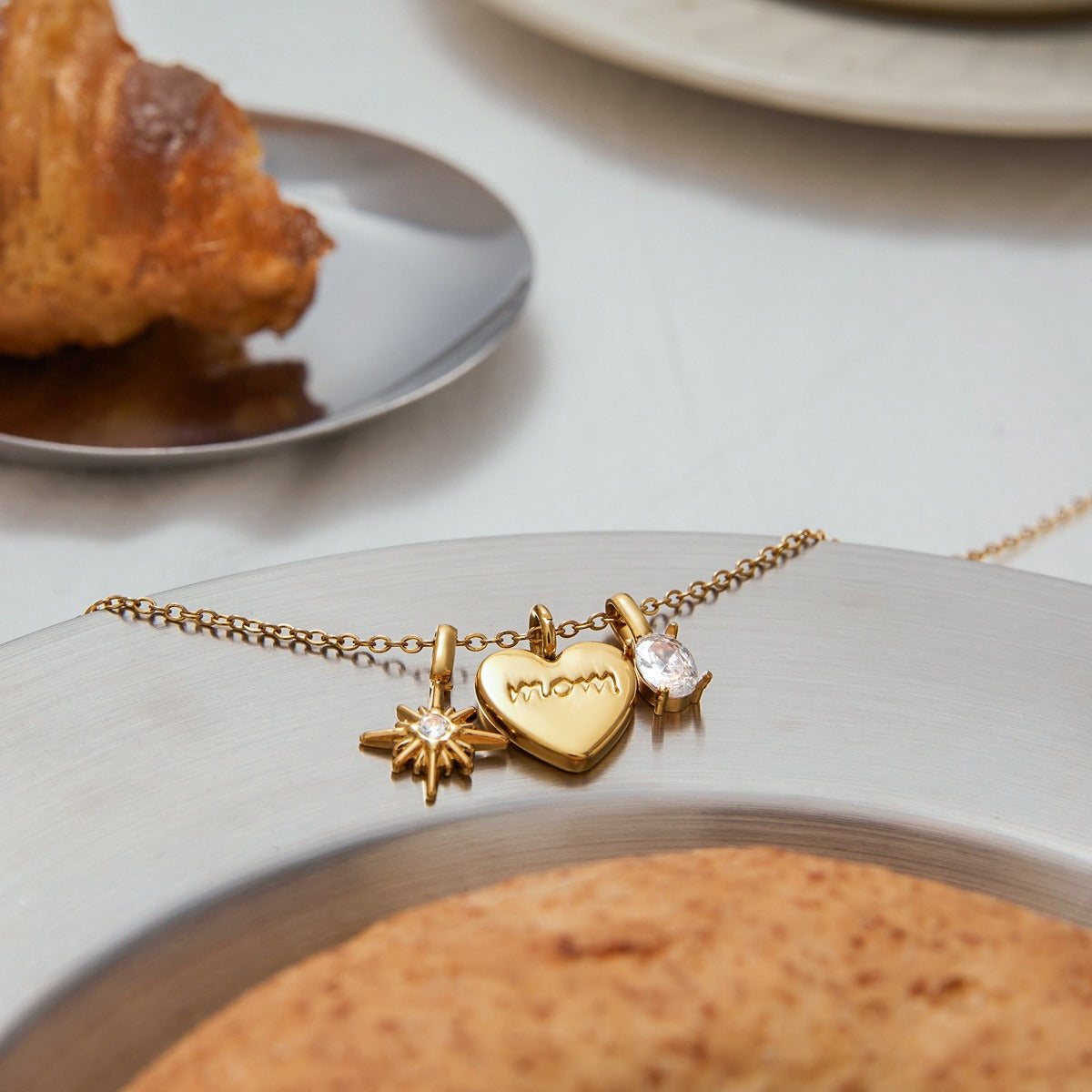 18K gold heart necklace with MOM letters and gemstone