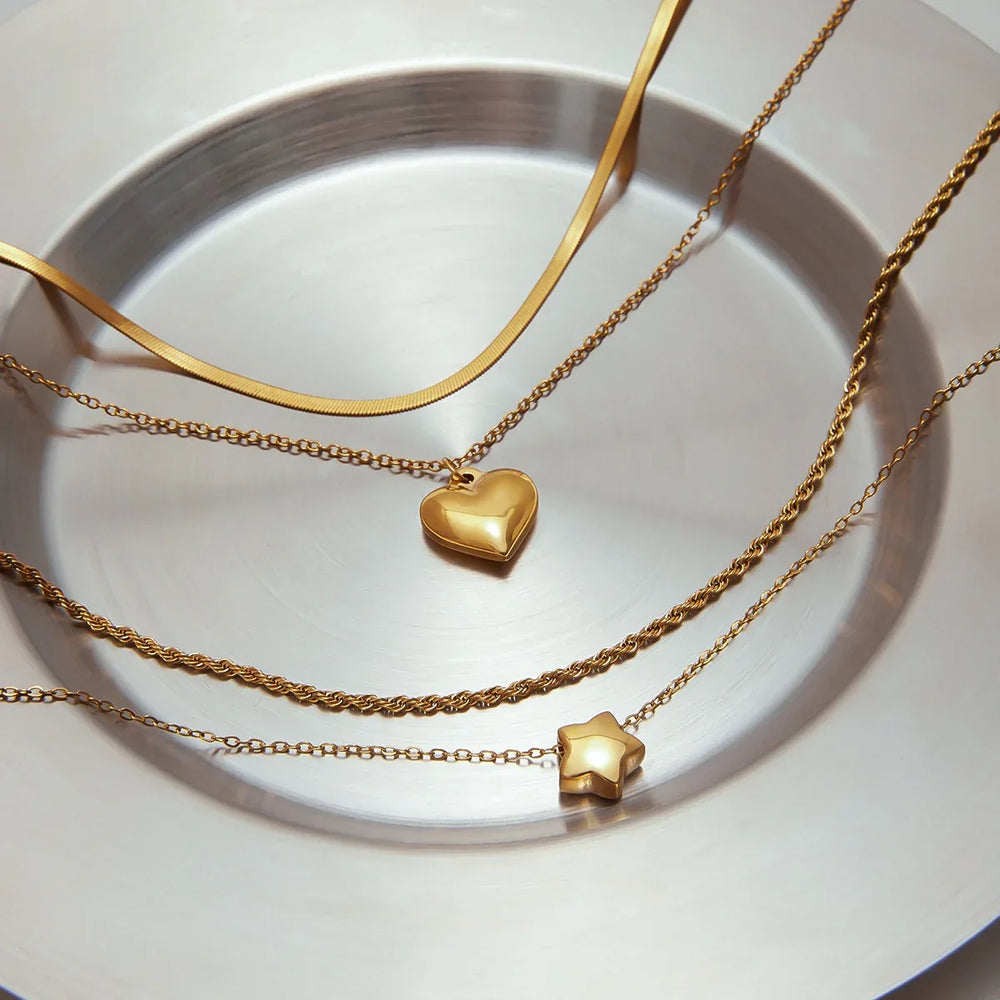 Double-layer chain necklace with playful star or romantic heart