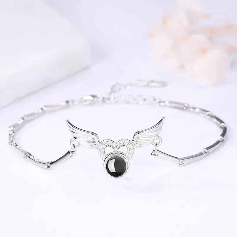 Celestial Guard Angel Wings Projection Bracelet - Jewelry for Unique Moments